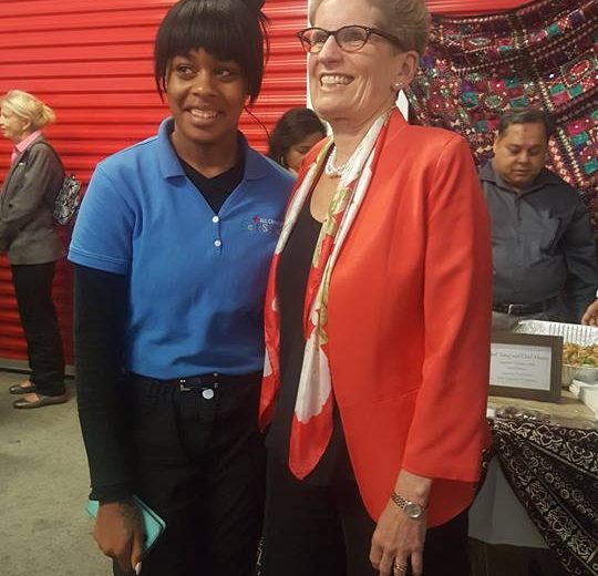 Flavours of Thorncliffe, two women standing in front of red storage unit lockers