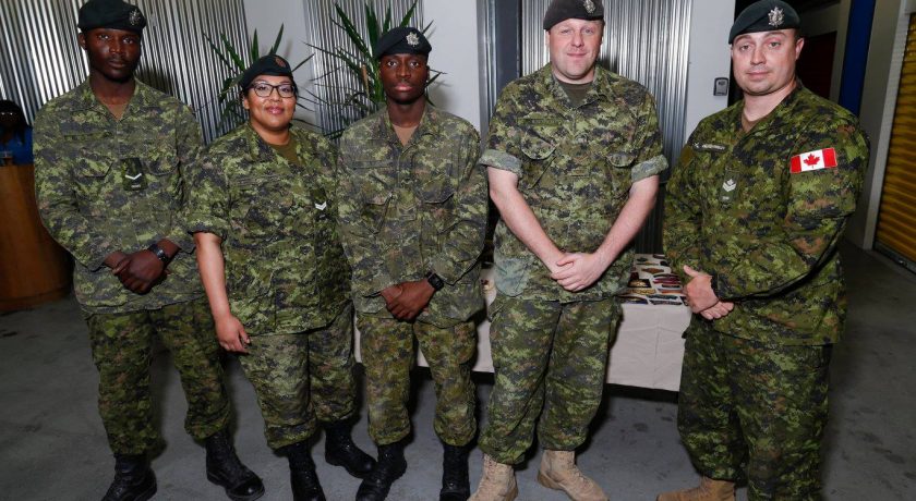 Queen's Own Rifles of Canada March, five people in green uniform standing