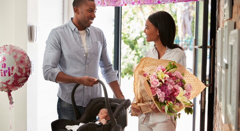 Portrait Of Family With Baby Son At Home indoors