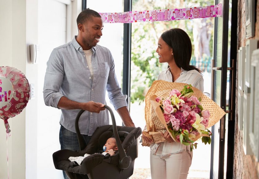 Portrait Of Family With Baby Son At Home indoors